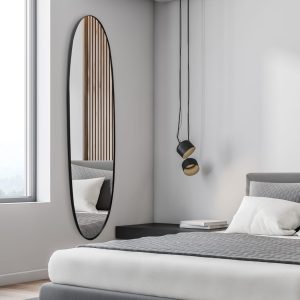 מראה אובלית צרה שחורה אלגנטית .